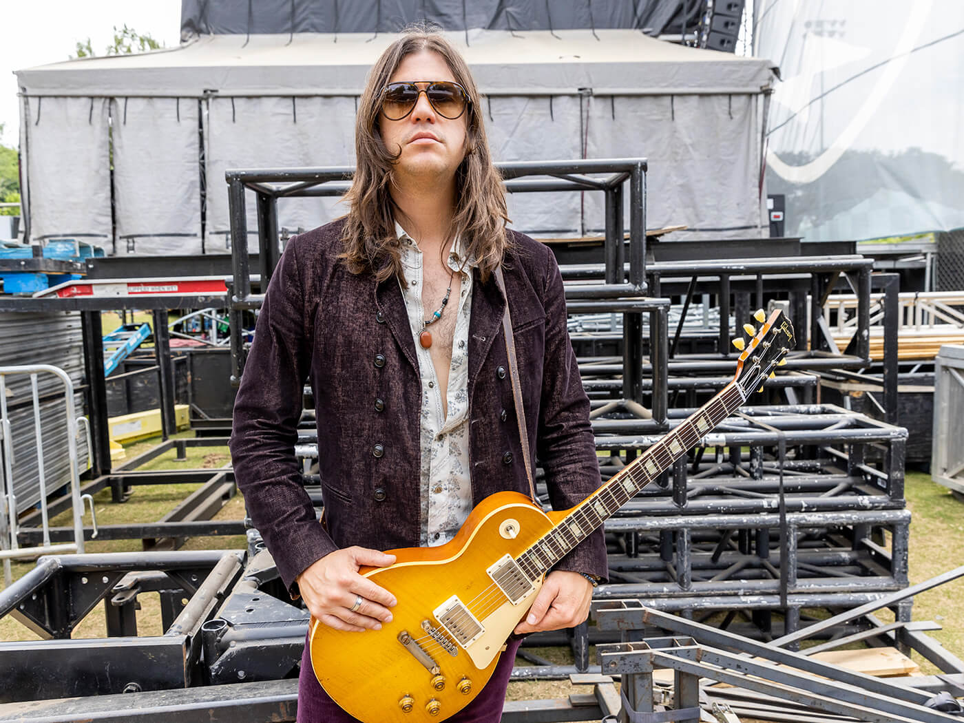 John Notto of Dirty Honey poses backstage on day 3 of the Shaky Knees Festival at Atlanta Central Park on May 01, 2022 in Atlanta, Georgia.